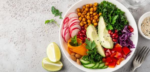 Colourful vegan salad in a bowl with a variety of vegetables