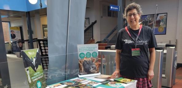 Vegan Society volunteer Evie, at The Vegan Society's event stand