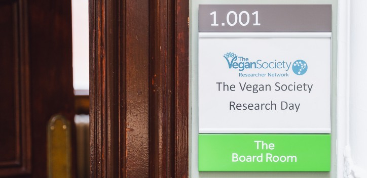 The Vegan Society Research Day sign on a door